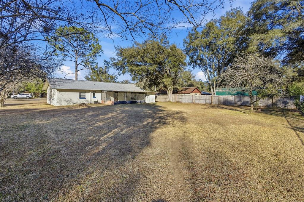2140 Northeast 39th Street Ocala, FL 34479 - Photo 5 of 28 a view of a house with a yard