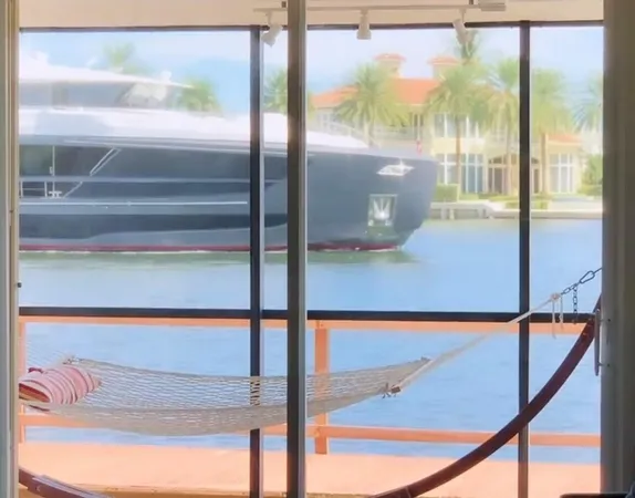 a view of a glass door with a floor to ceiling window