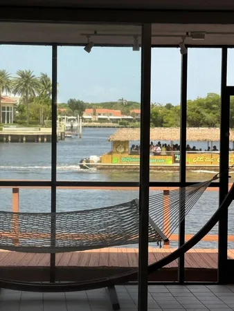 a view of a glass door and deck
