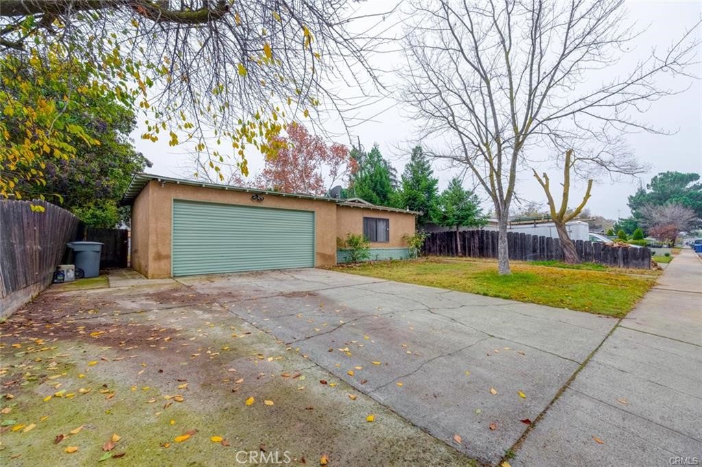 1670 Primrose Avenue Merced, CA 95340 - Photo 1 of 1 a view of a house with a yard and large tree