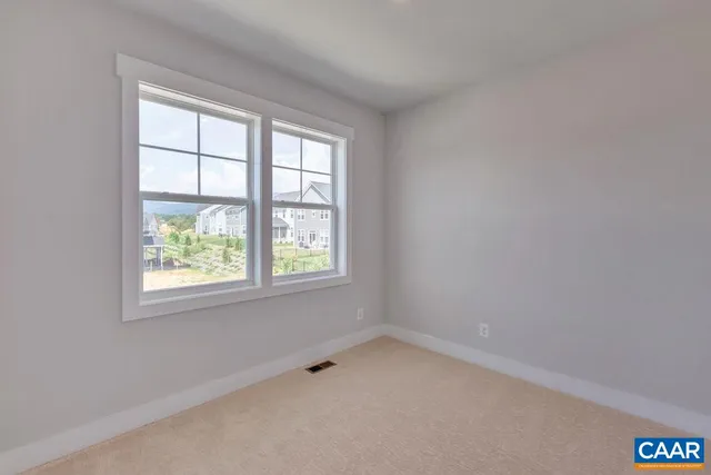 a bathroom with a granite countertop sink a mirror and a bathtub