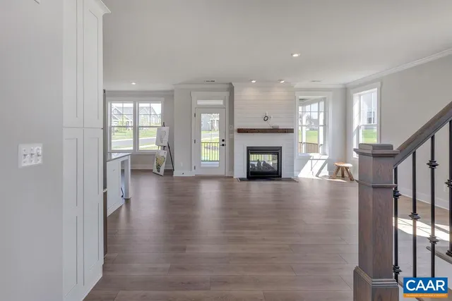 a view of livingroom with furniture and a fireplace