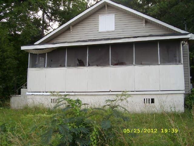 1422 Hamilton Road LaGrange, GA 30241 - Photo 1 of 1 a view of a house with a small yard