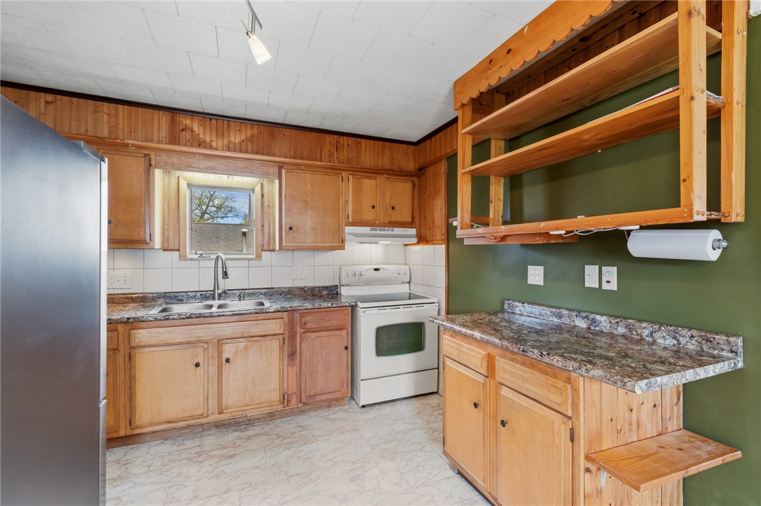 11 Maple Avenue Manchester, NY 14548 - Photo 13 of 39 The kitchen - opens to a dining area