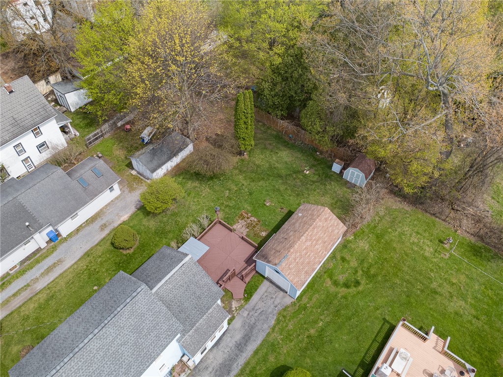 11 Maple Avenue Manchester, NY 14548 - Photo 7 of 39 The rear yard- the deck- shed - detached garage ar