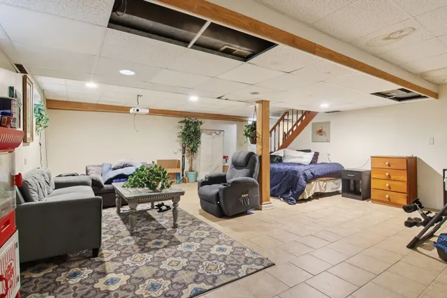 a view of a livingroom with furniture and a couch