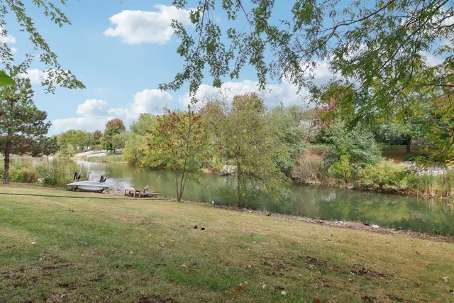 a backyard of a house with lots of green space
