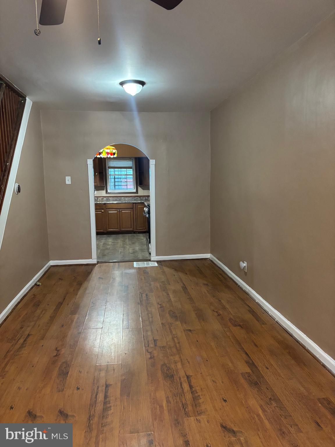 26 North Decker Avenue Baltimore, MD 21224 - Photo 5 of 14 a view of a room with wooden floor