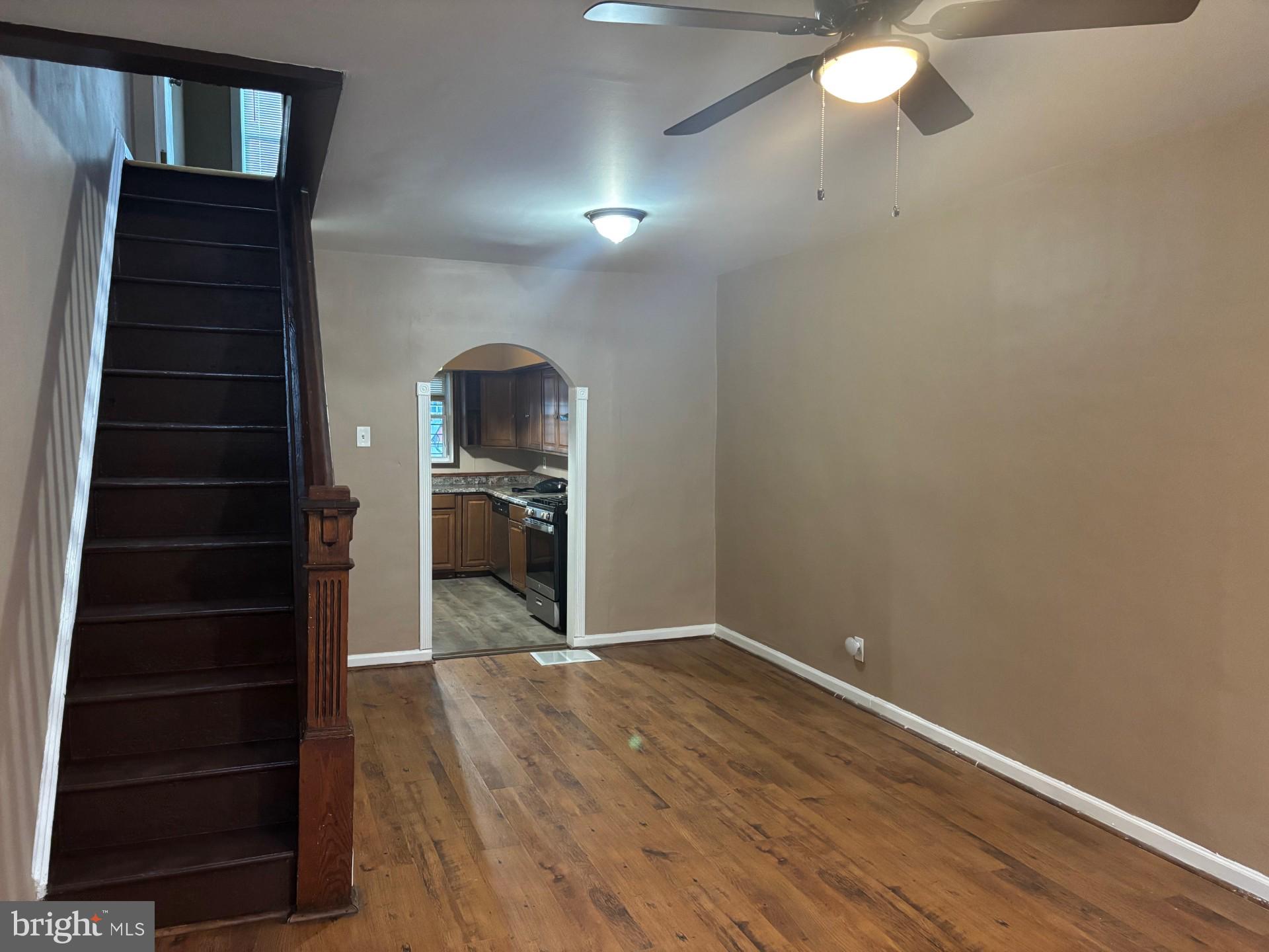 26 North Decker Avenue Baltimore, MD 21224 - Photo 7 of 14 a view of a hallway with wooden floor and entryway