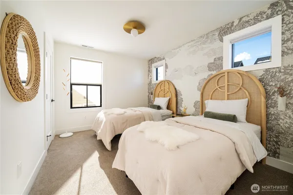 a bedroom with bed and a window