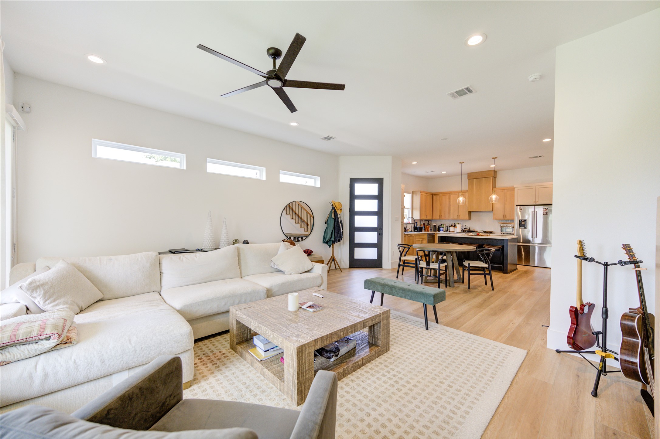 18 Sidney Street, Unit A Houston, TX 77003 - Photo 5 of 30 a living room with furniture and a wooden floor