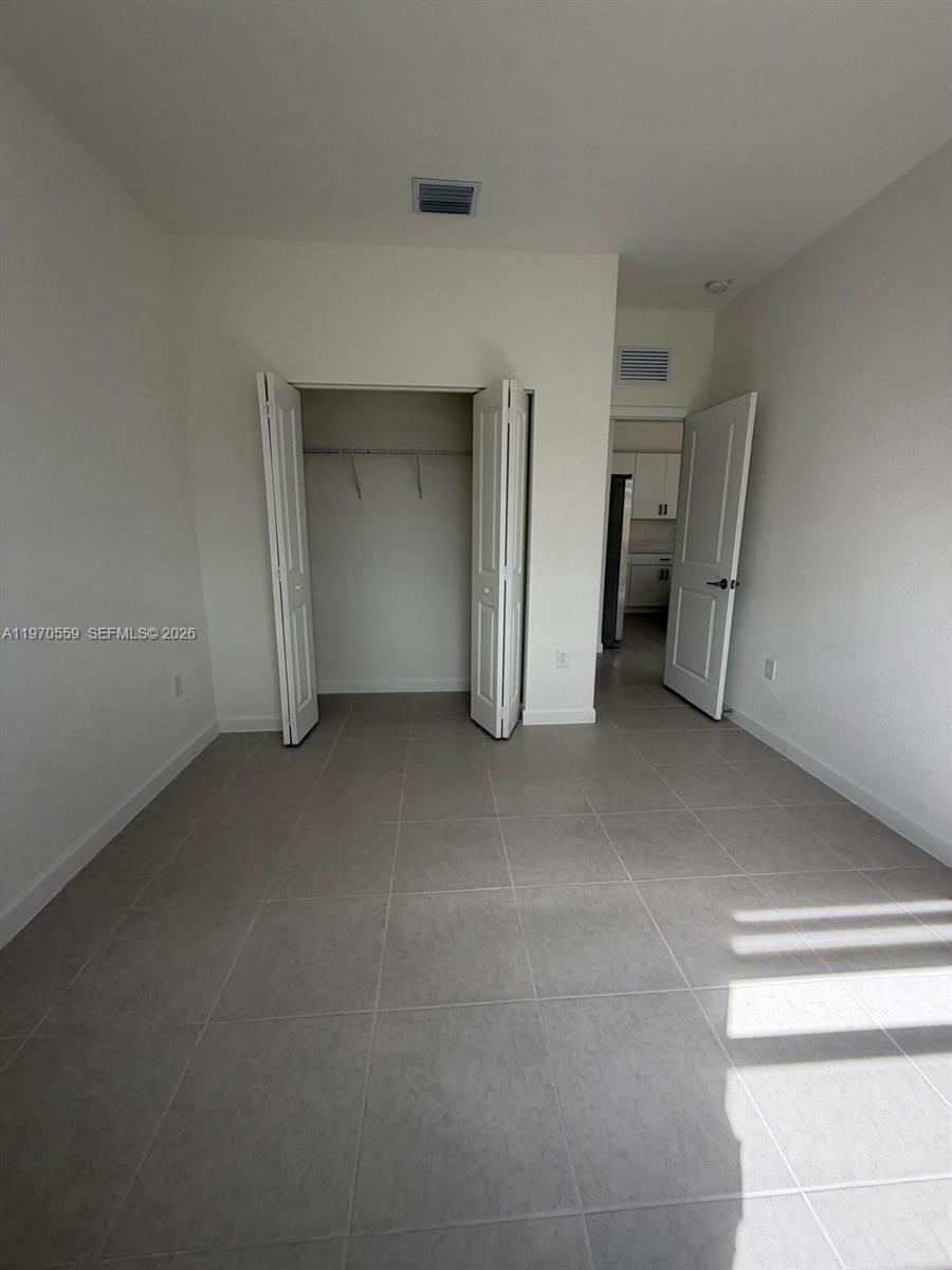 2638 Southeast 9th Street Homestead, FL 33035 - Photo 12 of 36 a view of empty room
