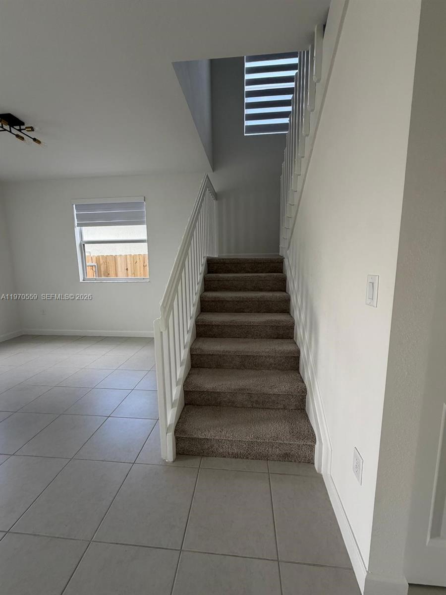 2638 Southeast 9th Street Homestead, FL 33035 - Photo 15 of 36 a view of entryway and hall with wooden floor