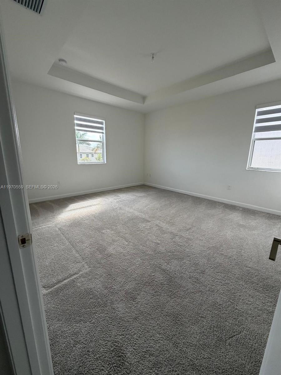 2638 Southeast 9th Street Homestead, FL 33035 - Photo 20 of 36 an empty room with windows