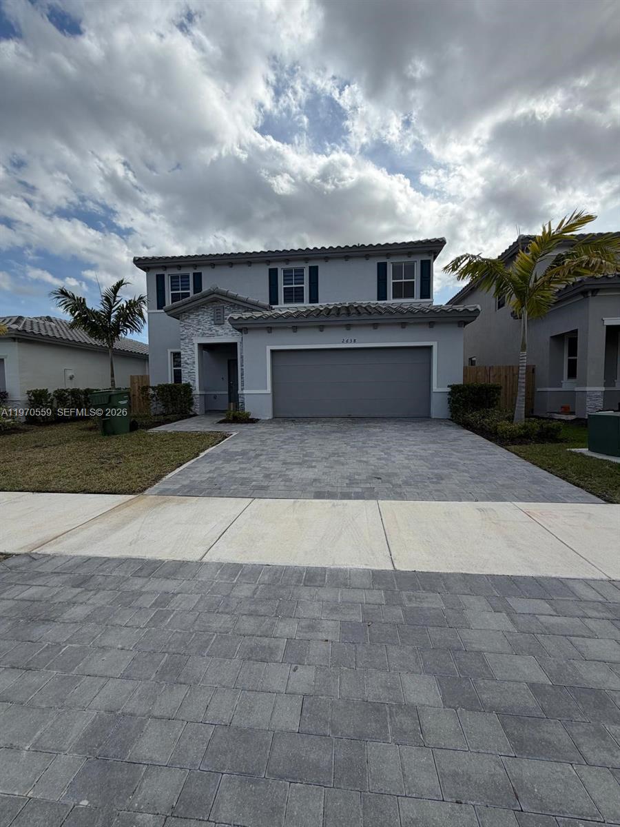 2638 Southeast 9th Street Homestead, FL 33035 - Photo 2 of 36 a view of a house with a yard
