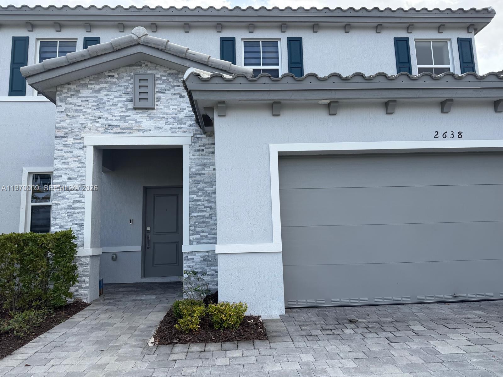 2638 Southeast 9th Street Homestead, FL 33035 - Photo 3 of 36 a front view of a house