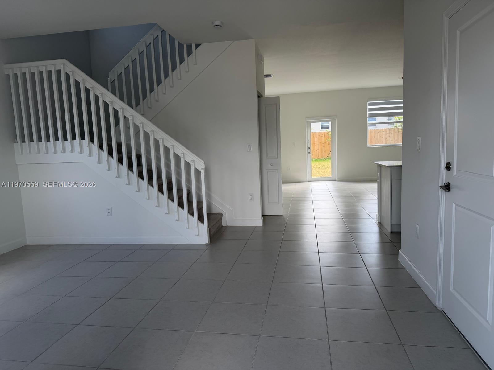 2638 Southeast 9th Street Homestead, FL 33035 - Photo 5 of 36 a view of a hallway view with staircase