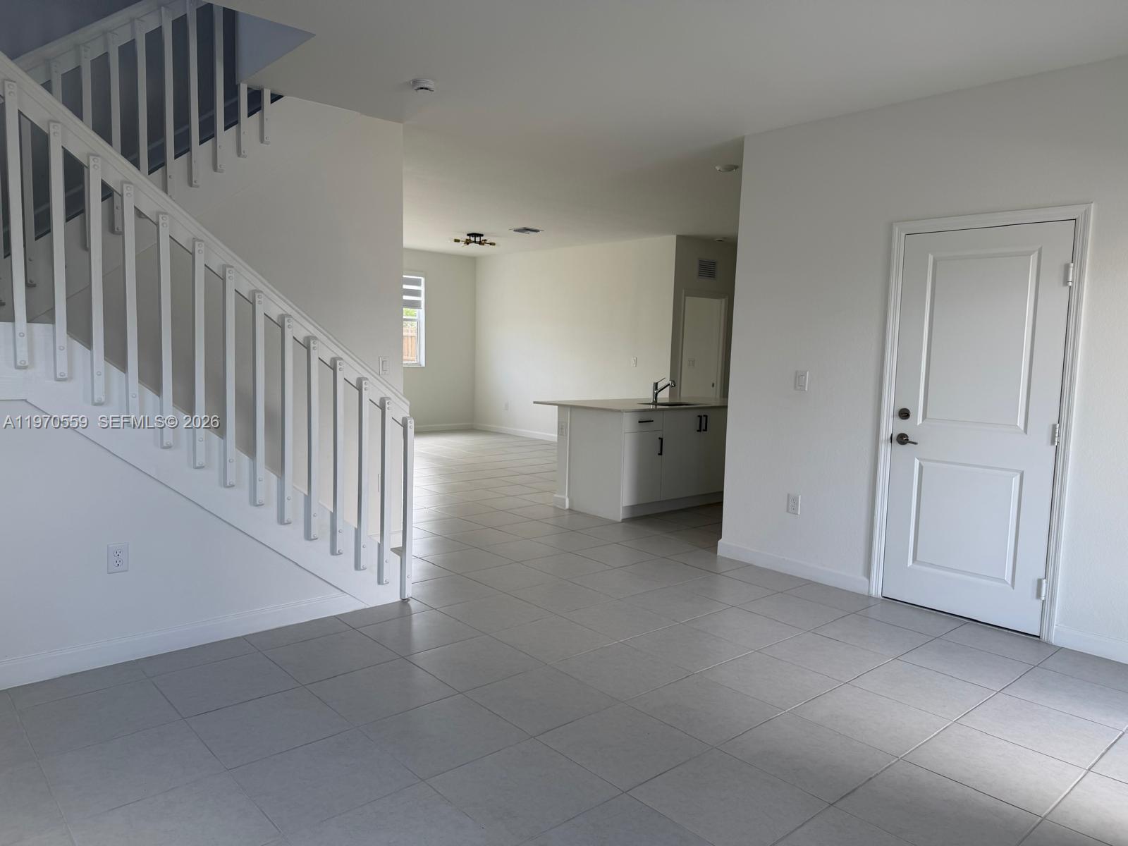 2638 Southeast 9th Street Homestead, FL 33035 - Photo 6 of 36 a view of a hallway with seating area