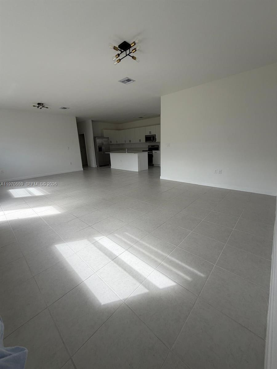2638 Southeast 9th Street Homestead, FL 33035 - Photo 8 of 36 a view of a big room with closet