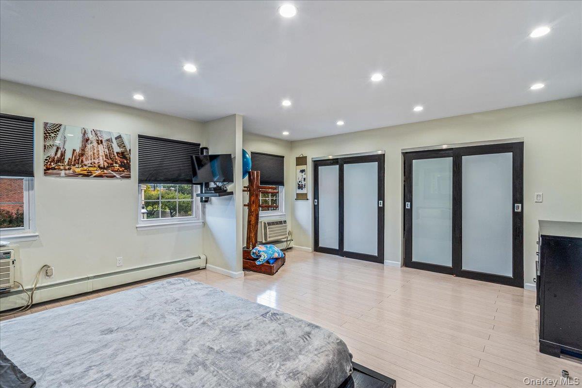 208-06 Robert Road, Unit 2 Queens, NY 11360 - Photo 5 of 26 a view of a living room