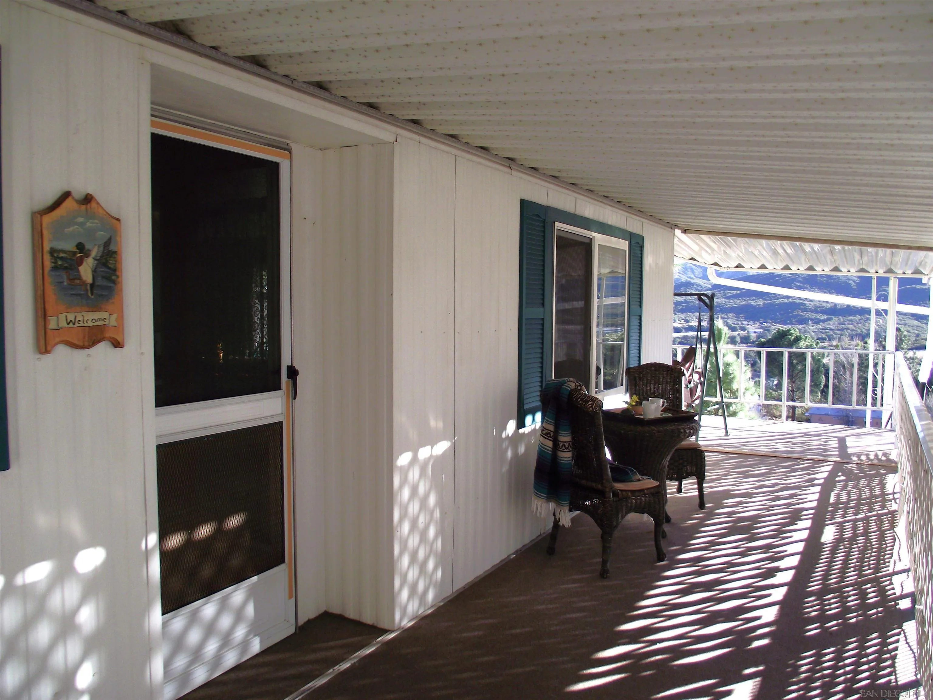35109 Highway 79, Unit /SPC #25 Warner Springs, CA 92086 - Photo 11 of 65 a building outdoor space with patio furniture and windows