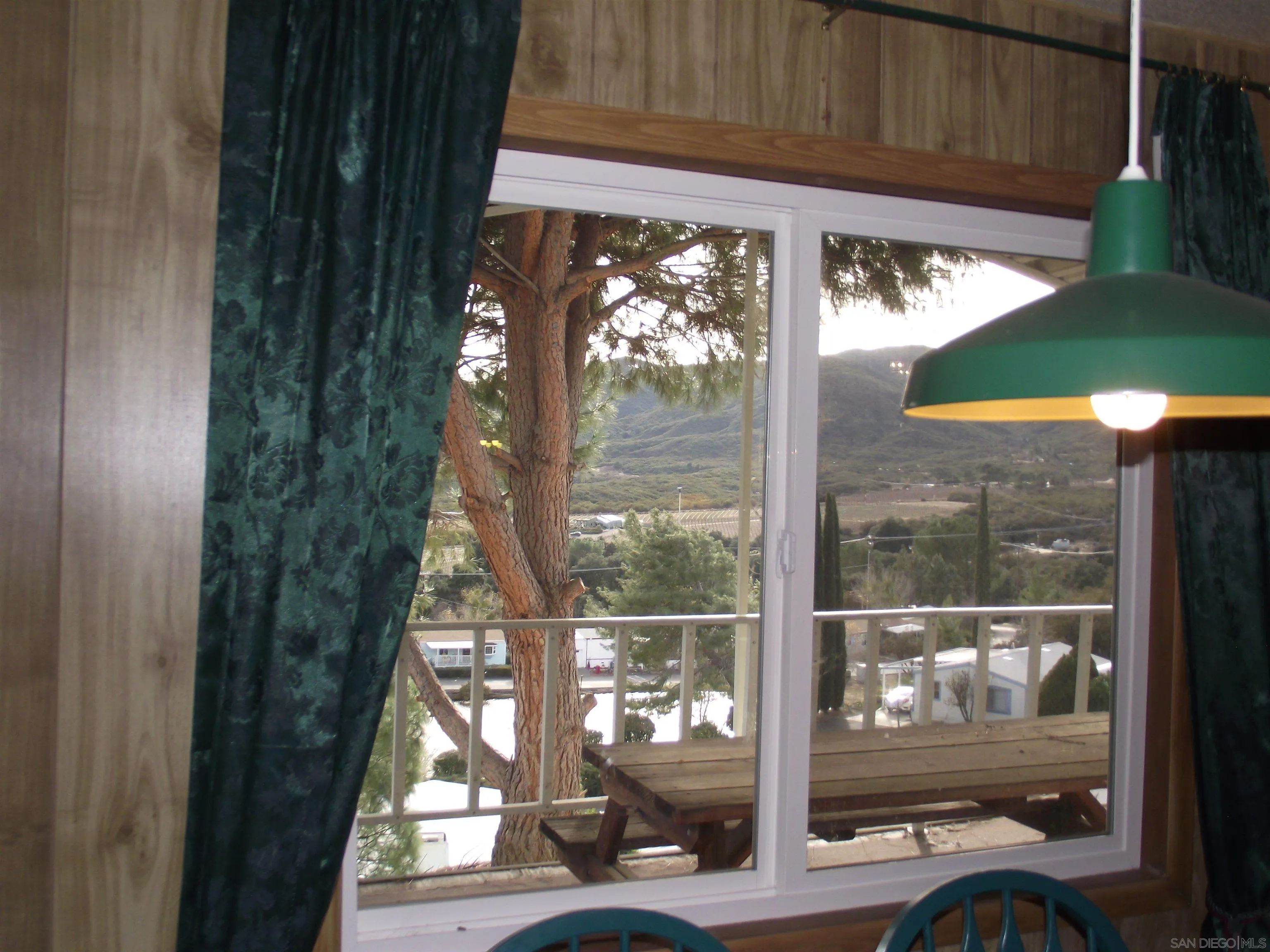 35109 Highway 79, Unit /SPC #25 Warner Springs, CA 92086 - Photo 17 of 65 a view of a glass door with a small yard