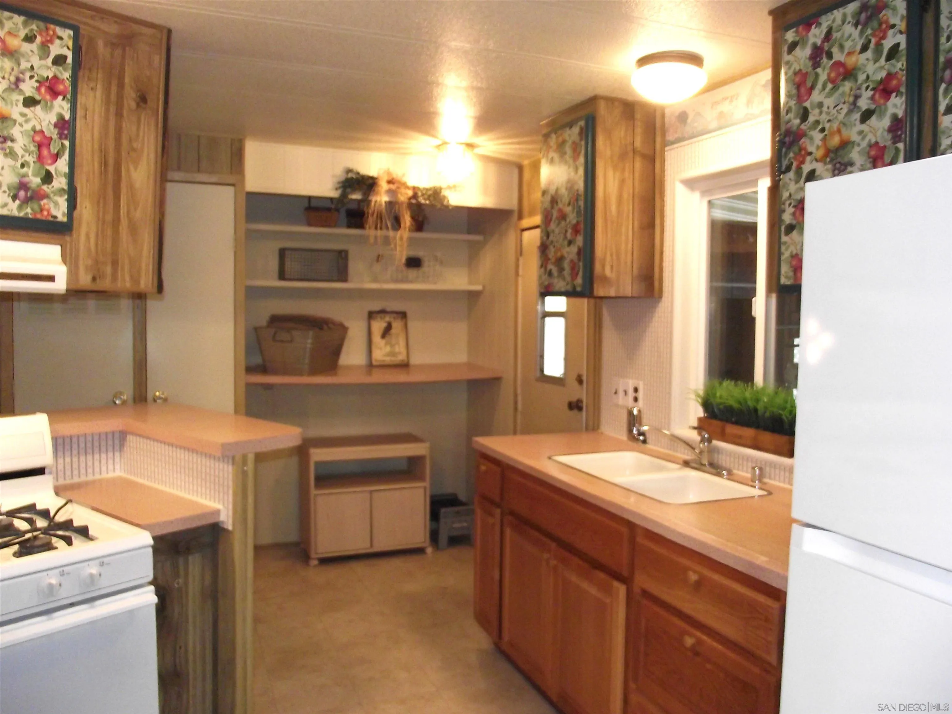 35109 Highway 79, Unit /SPC #25 Warner Springs, CA 92086 - Photo 19 of 65 a bathroom with a sink and a mirror