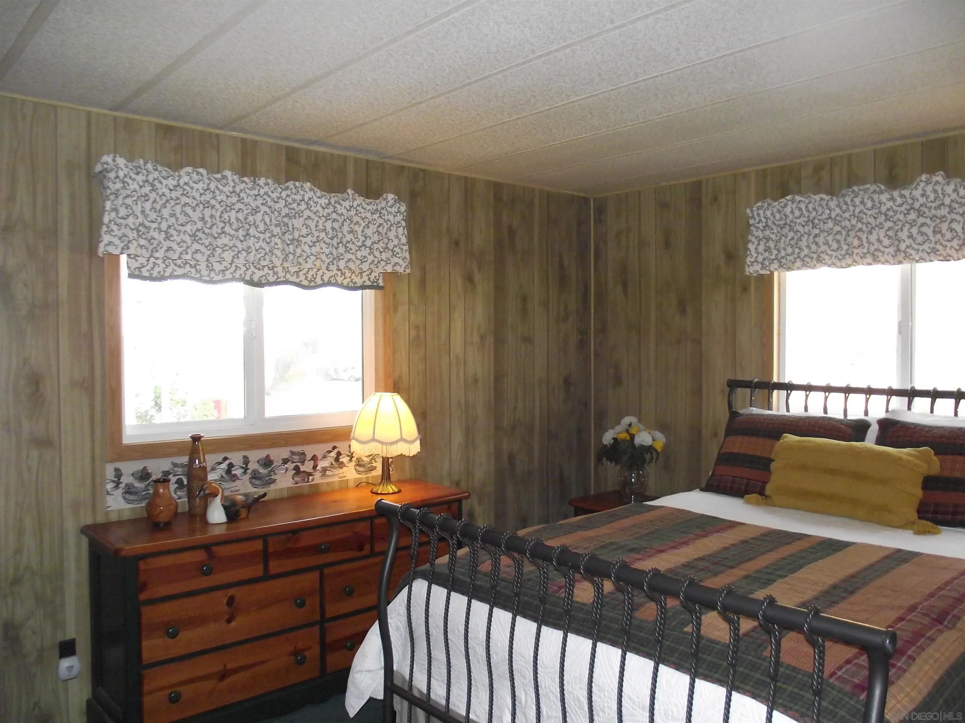 35109 Highway 79, Unit /SPC #25 Warner Springs, CA 92086 - Photo 31 of 65 a bedroom with a bed and wooden floor