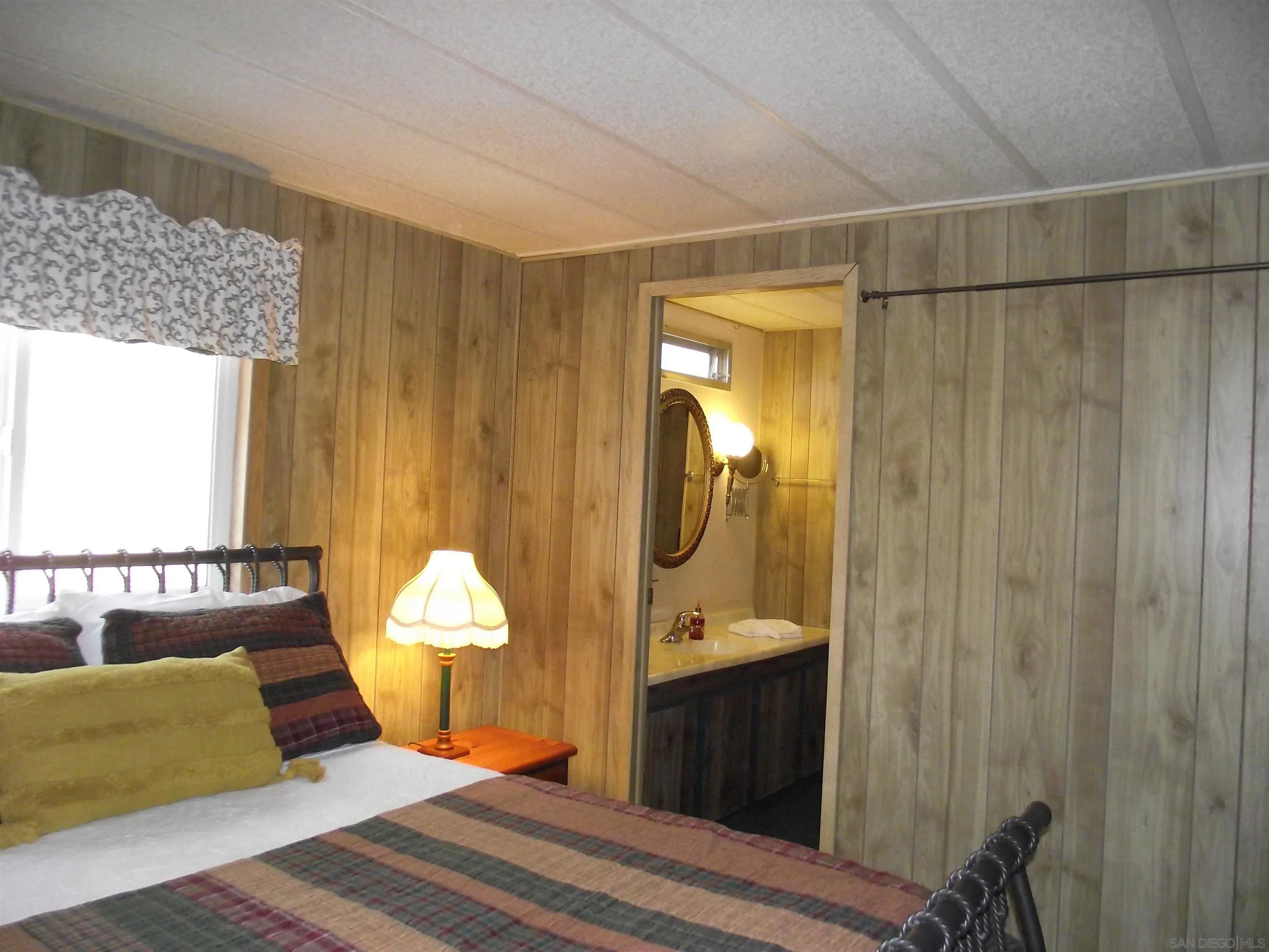 35109 Highway 79, Unit /SPC #25 Warner Springs, CA 92086 - Photo 32 of 65 a bedroom with a bed and a window