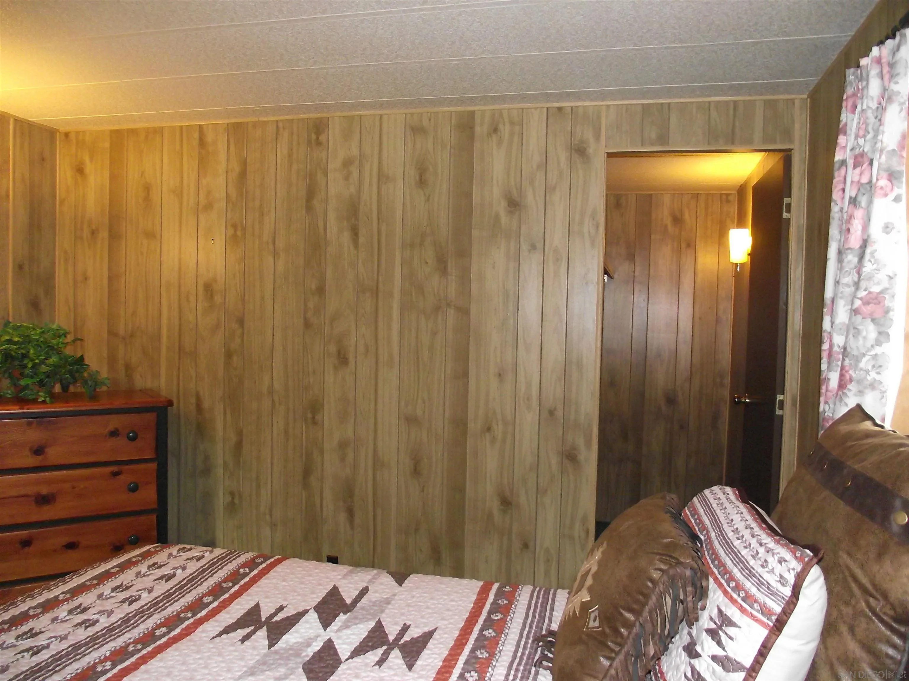 35109 Highway 79, Unit /SPC #25 Warner Springs, CA 92086 - Photo 40 of 65 a bedroom with a bed and a dresser