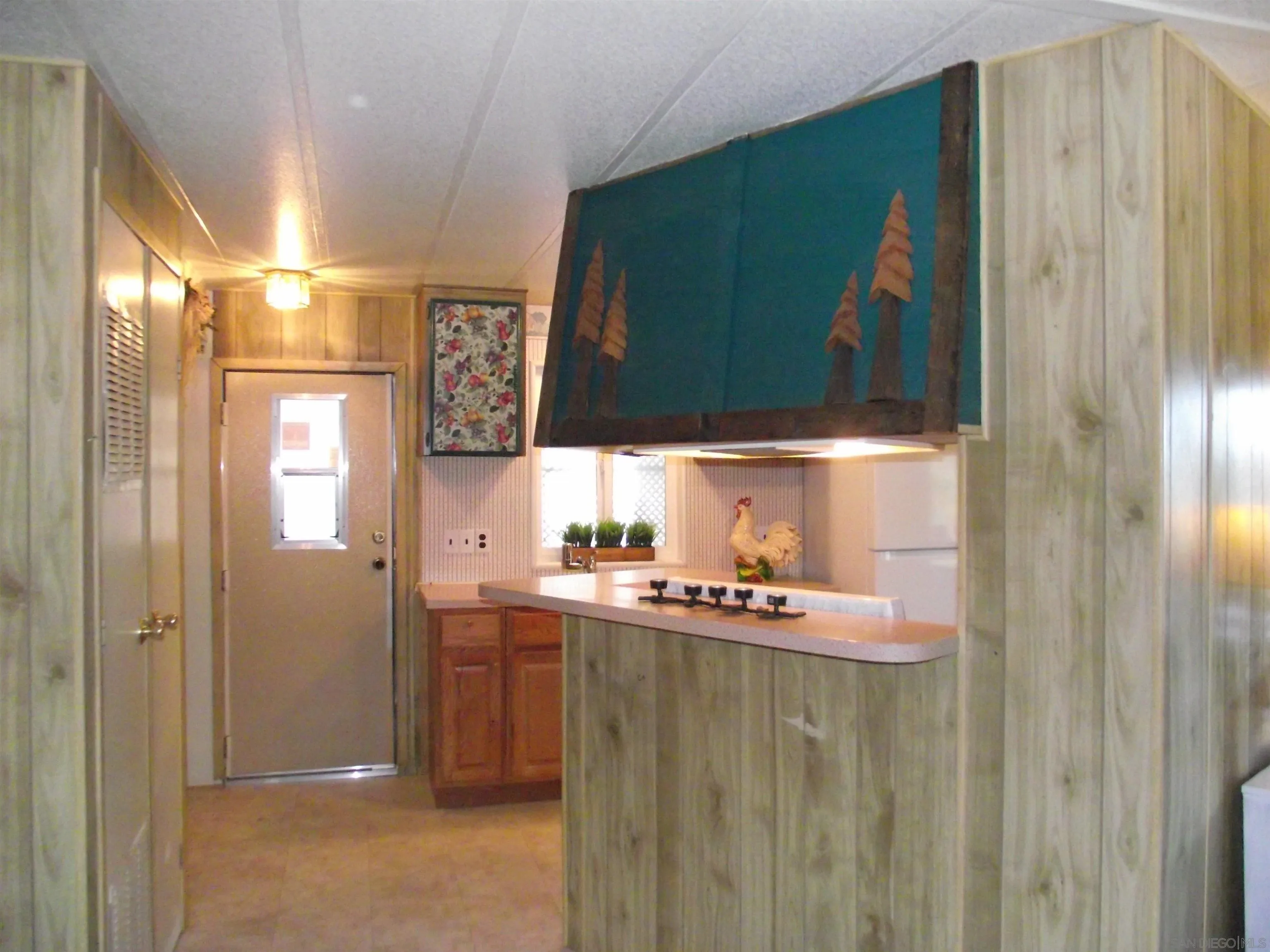 35109 Highway 79, Unit /SPC #25 Warner Springs, CA 92086 - Photo 47 of 65 a kitchen with a refrigerator and a stove