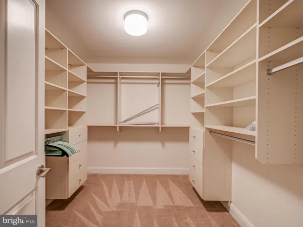 a view of an empty walk in closet