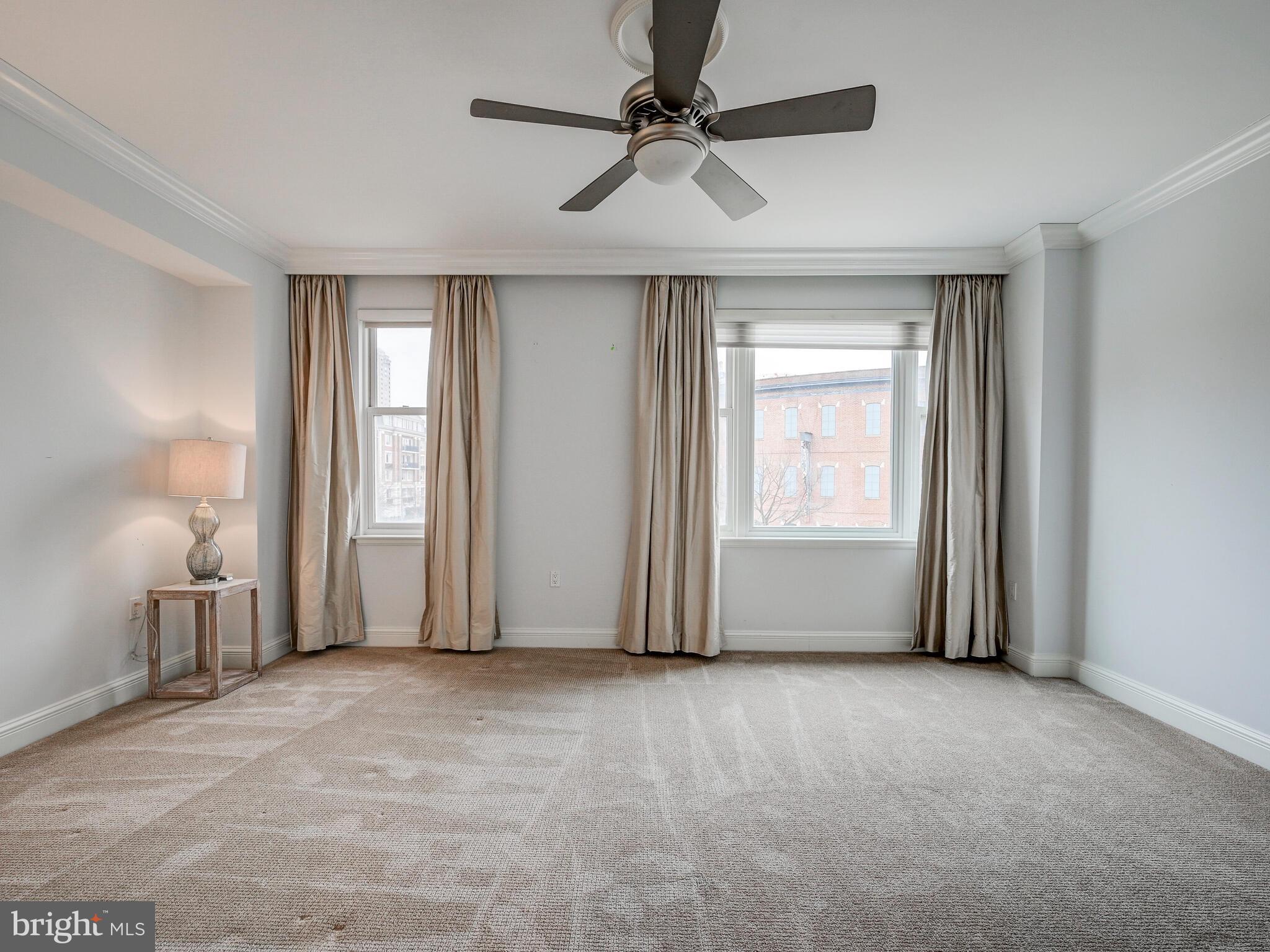 801 Key Highway, Unit 312 Baltimore, MD 21230 - Photo 28 of 45 a view of empty room with windows