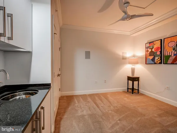 a kitchen with a stove and a refrigerator