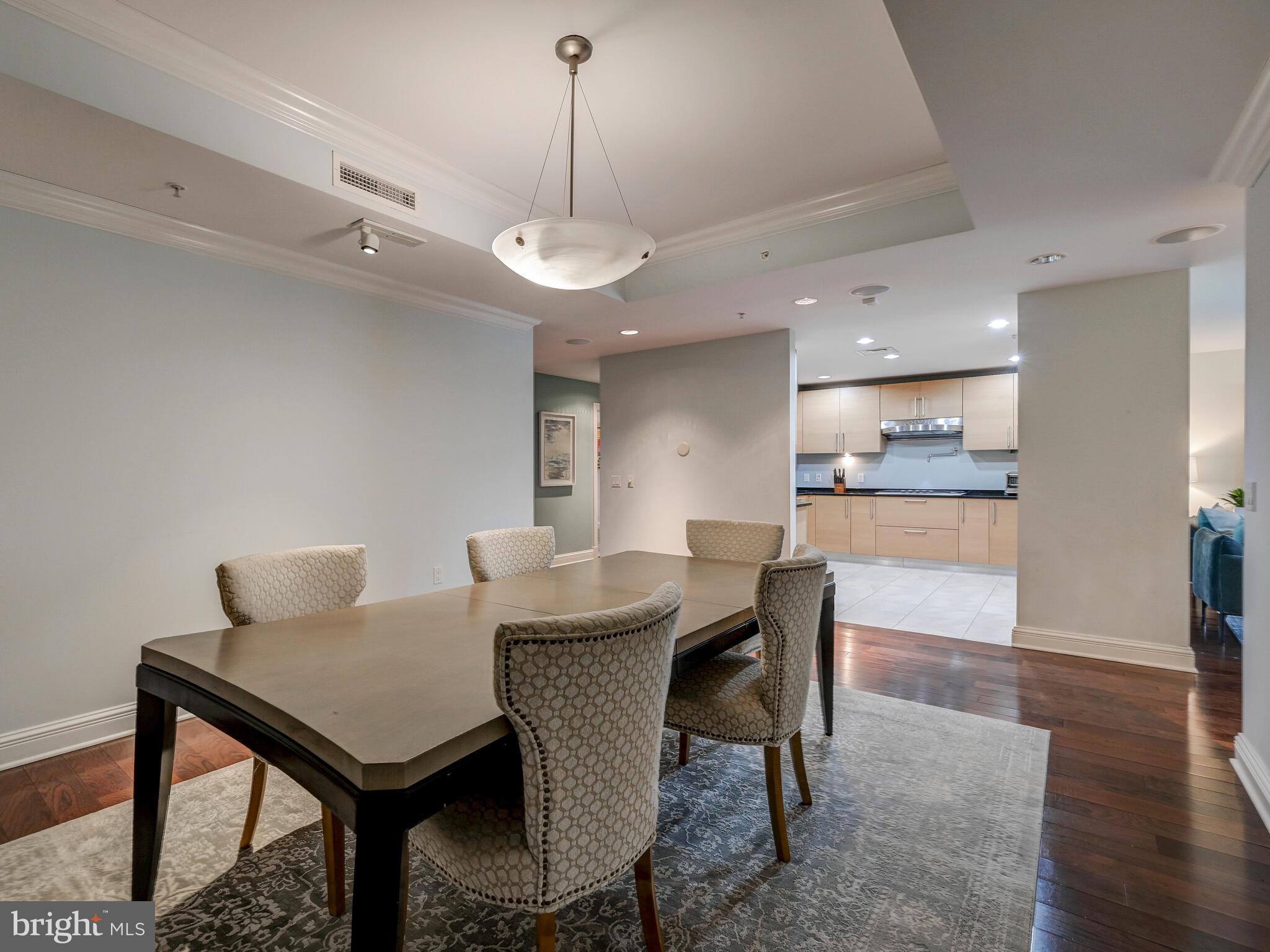 801 Key Highway, Unit 312 Baltimore, MD 21230 - Photo 7 of 45 a view of a dining room with furniture