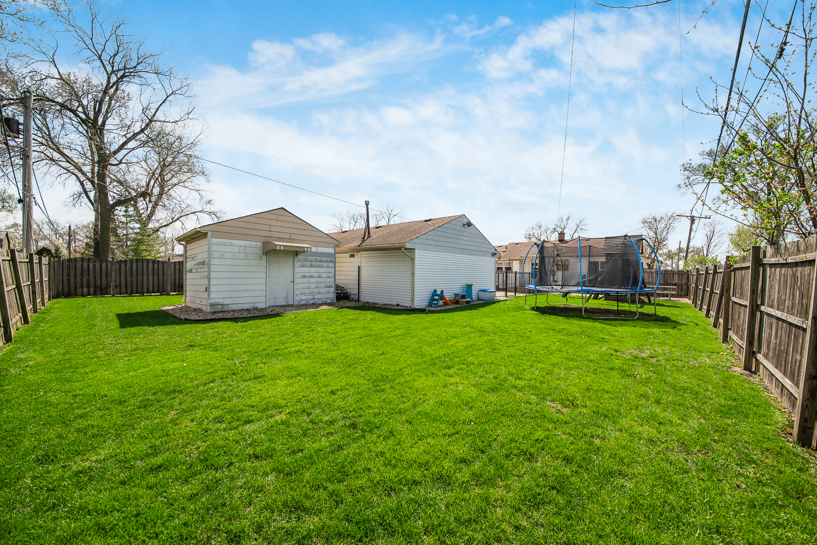 7517 Beloit Avenue Bridgeview, IL 60455 - Photo 16 of 18 a view of a house with backyard and garden