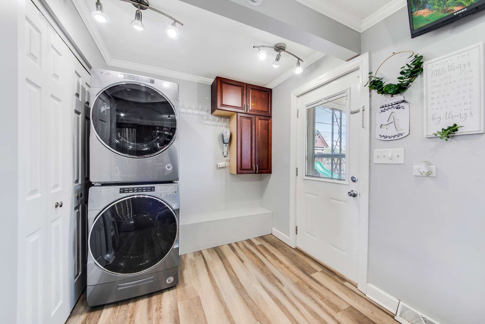 7517 Beloit Avenue Bridgeview, IL 60455 - Photo 6 of 18 a view of a hallway with washer and dryer
