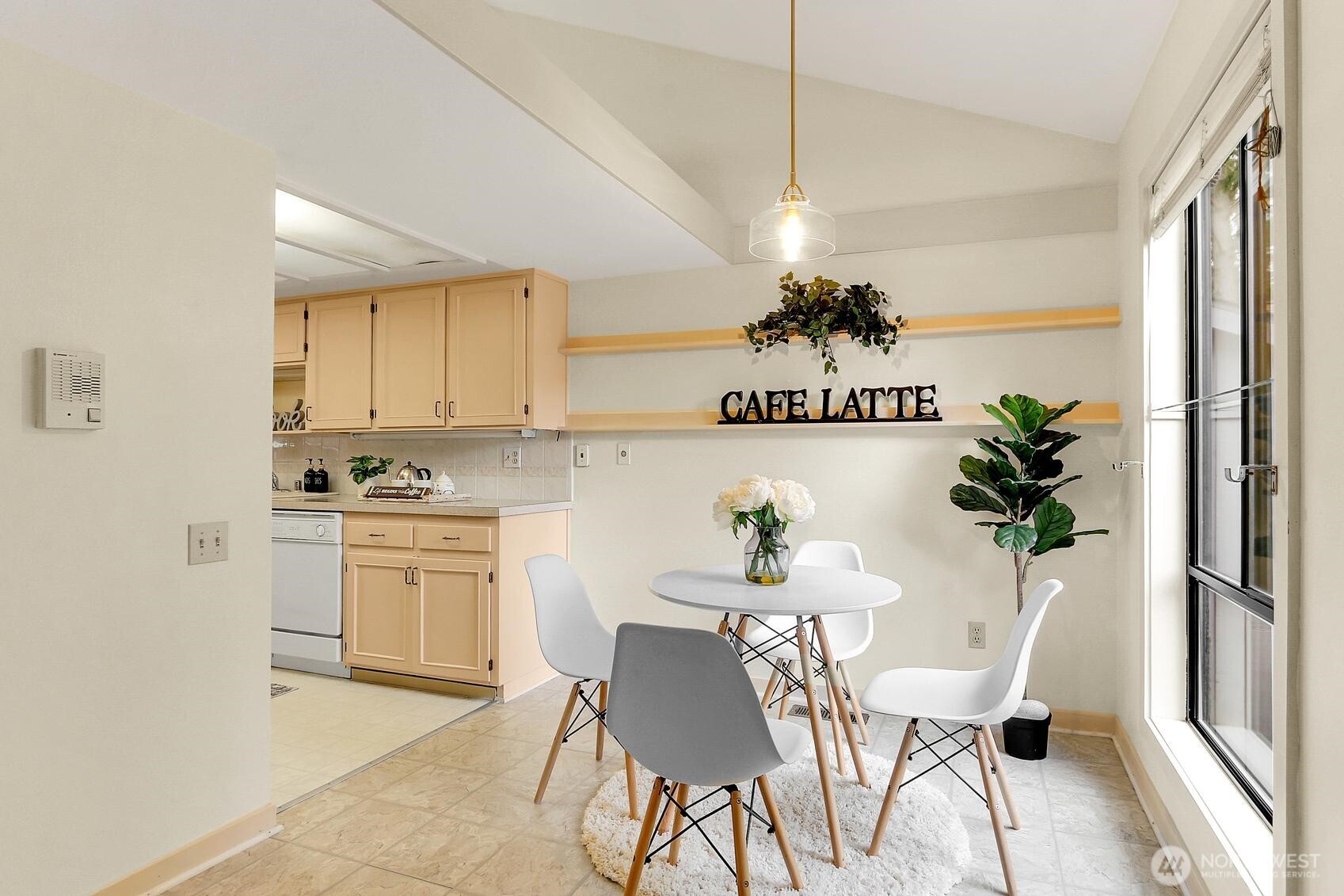 1541 Northeast 143rd Street, Unit H5 Seattle, WA 98125 - Photo 14 of 31 a view of kitchen and dining area with furniture