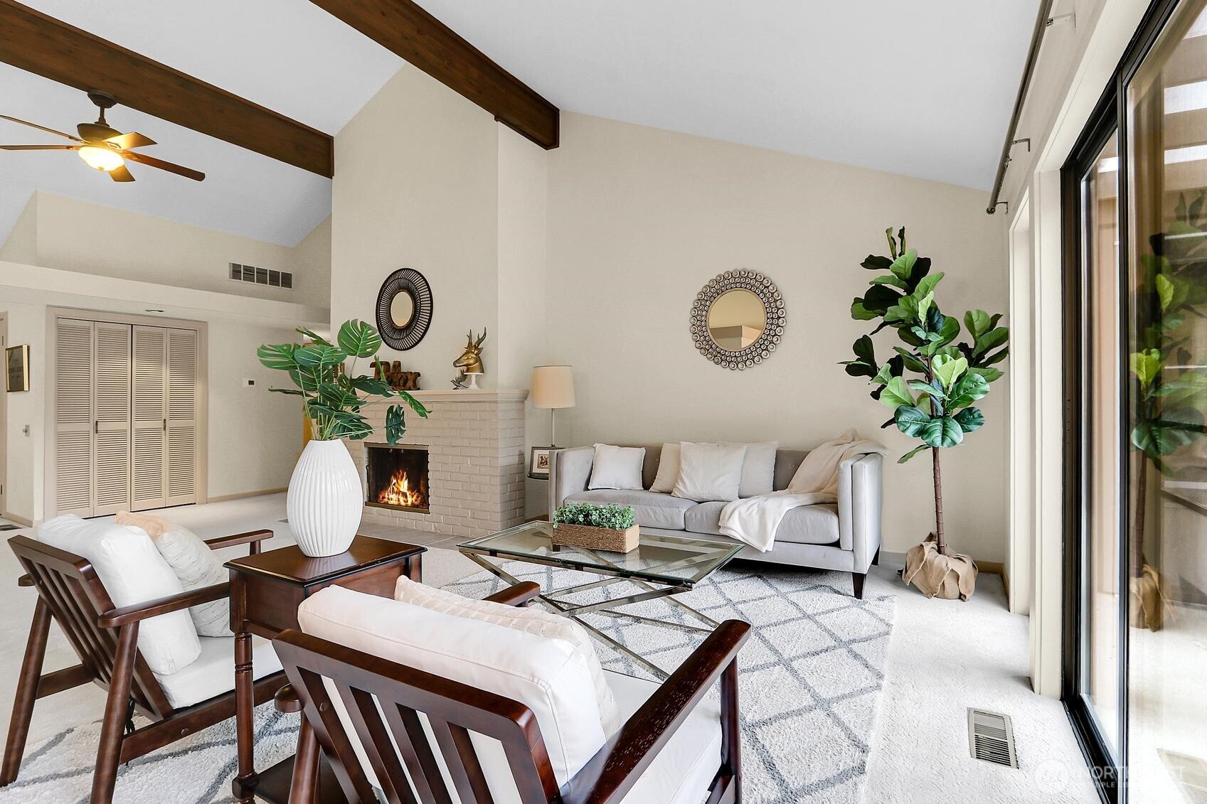 1541 Northeast 143rd Street, Unit H5 Seattle, WA 98125 - Photo 7 of 31 a view of a dining room with furniture and a potted plant