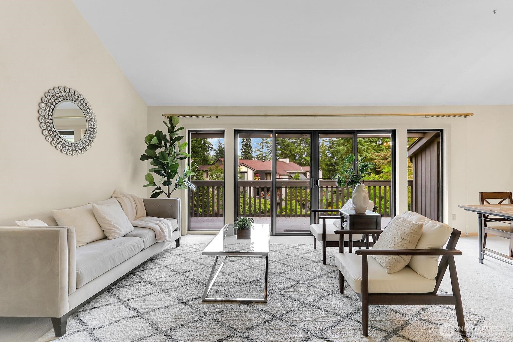1541 Northeast 143rd Street, Unit H5 Seattle, WA 98125 - Photo 9 of 31 a living room with furniture and a large window