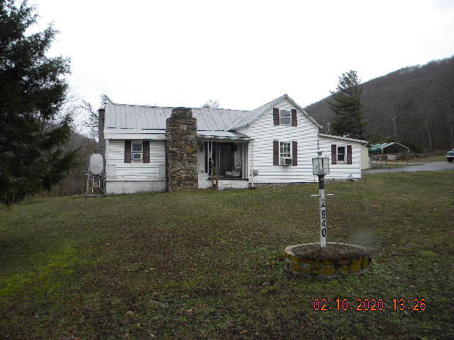 2940 North Fork Road Elliston, VA 24087 - Photo 1 of 18 a front view of a house with a garden