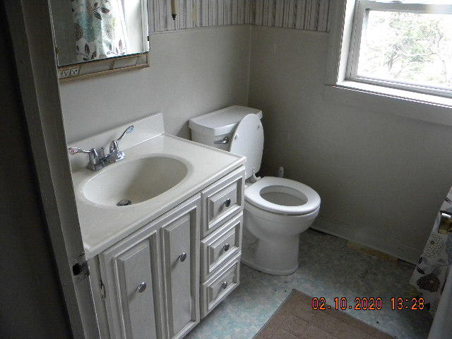 2940 North Fork Road Elliston, VA 24087 - Photo 3 of 18 a bathroom with a sink and a toilet