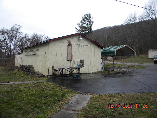 2940 North Fork Road Elliston, VA 24087 - Photo 5 of 18 a backyard of a house with table and chairs