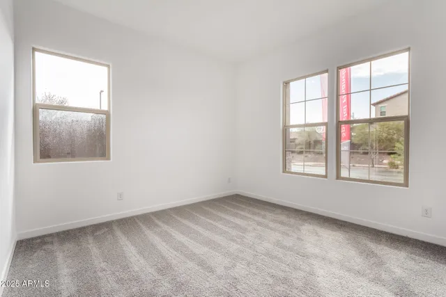 a view of a room with a en suite bathroom