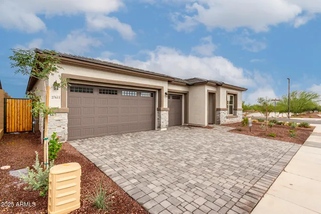 a view of a house with a snow in the yard