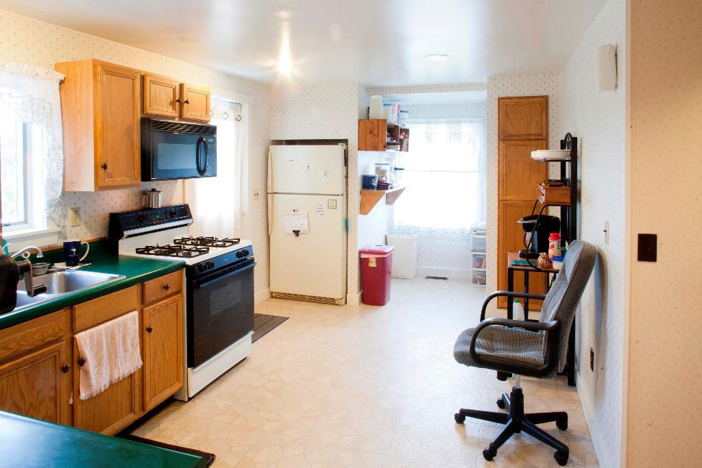 1223 Great Pond Road Aurora, ME 04408 - Photo 16 of 28 Table for 4 to 6 will easily fits here