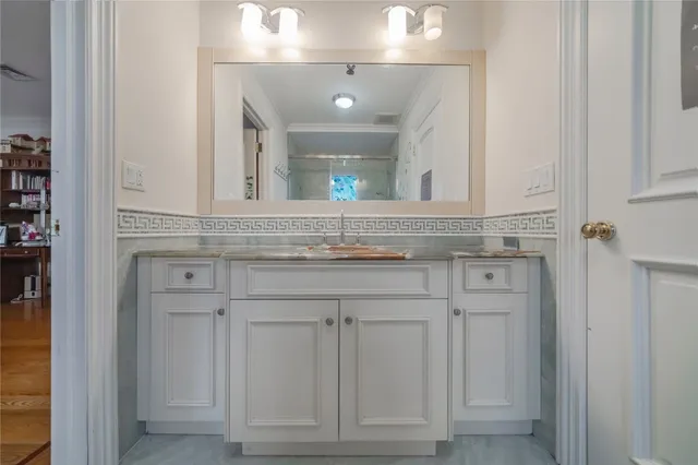 a sink with a mirror
