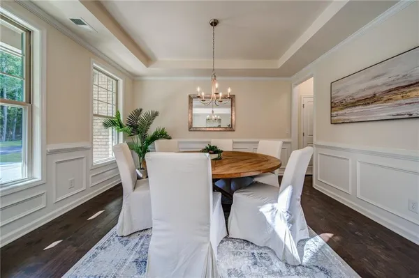 a living room with furniture fireplace and window
