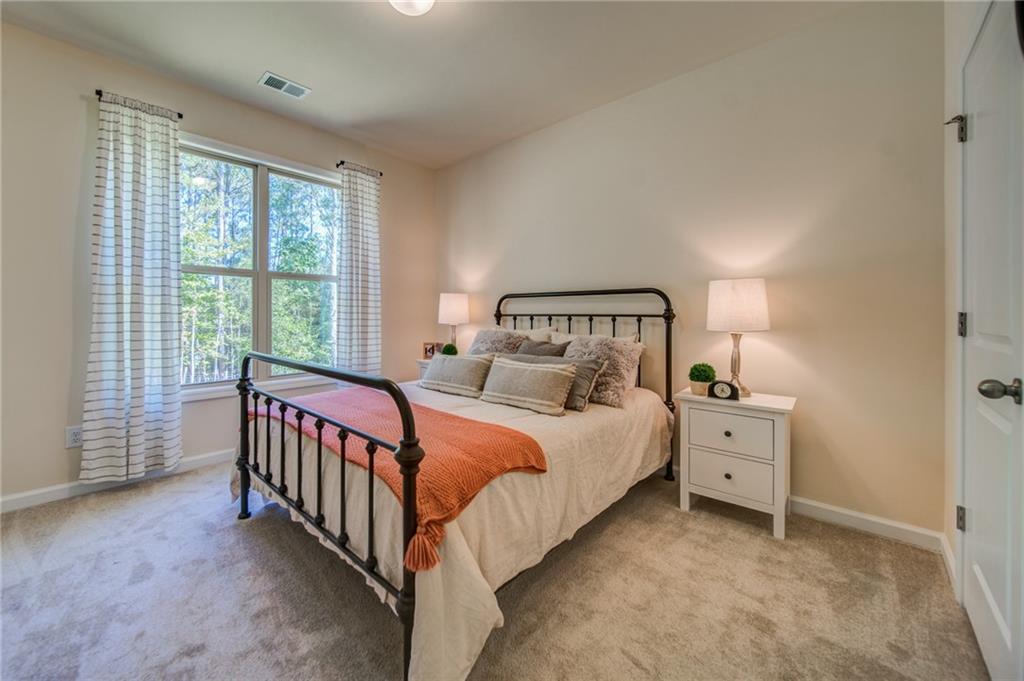 3430 South Scales Road Duluth, GA 30097 - Photo 33 of 77 a bed room with a bed and a window