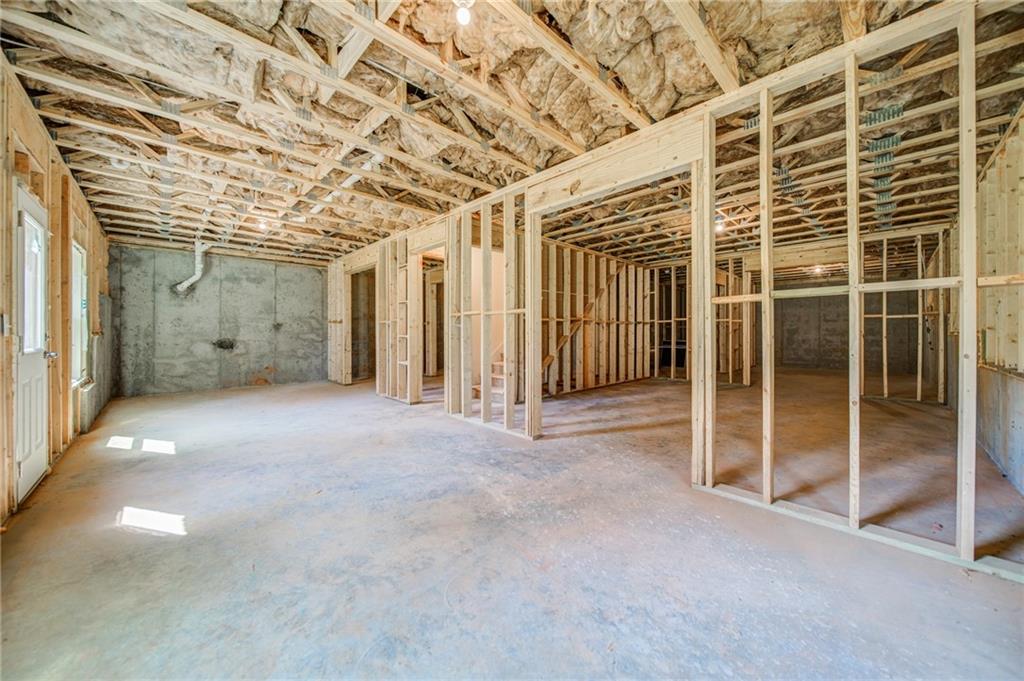 3430 South Scales Road Duluth, GA 30097 - Photo 65 of 77 a view of empty room with wooden floor